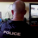 An Alexandria, Va., police officer monitors two hotel rooms as part of a national FBI sting to end child trafficking and prostitution.
CBS News